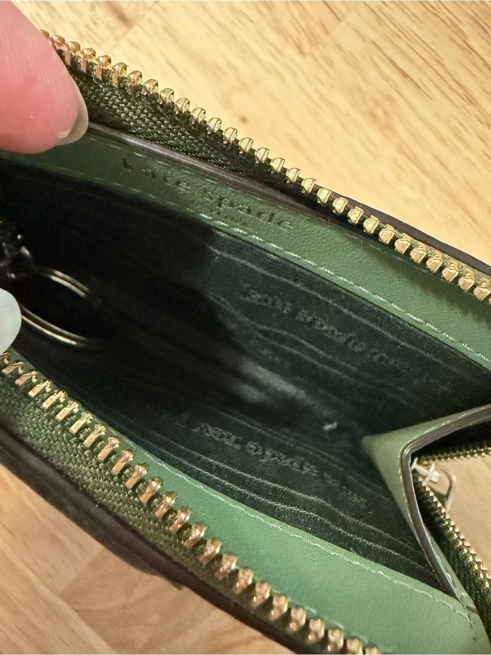 Kate Spade New York green leather wallet with pebbled texture in great condition